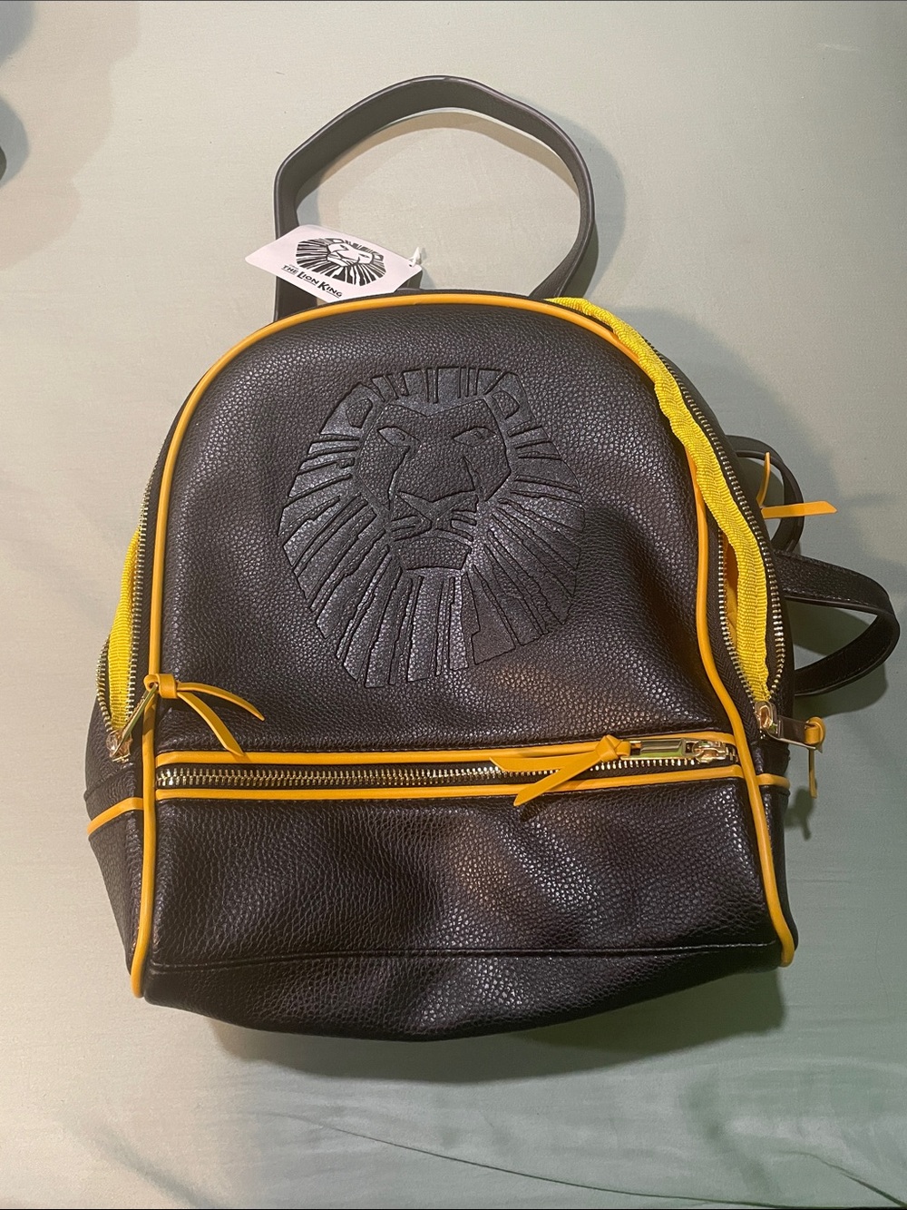 Disney Black Mini Backpack with Yellow Trim and Lion Emboss